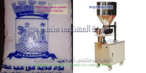 ماكينة تعبئة سكر وارز وعدس وملح وفول من شركة المهندس منسي ماكينات التعبئة و التغليف